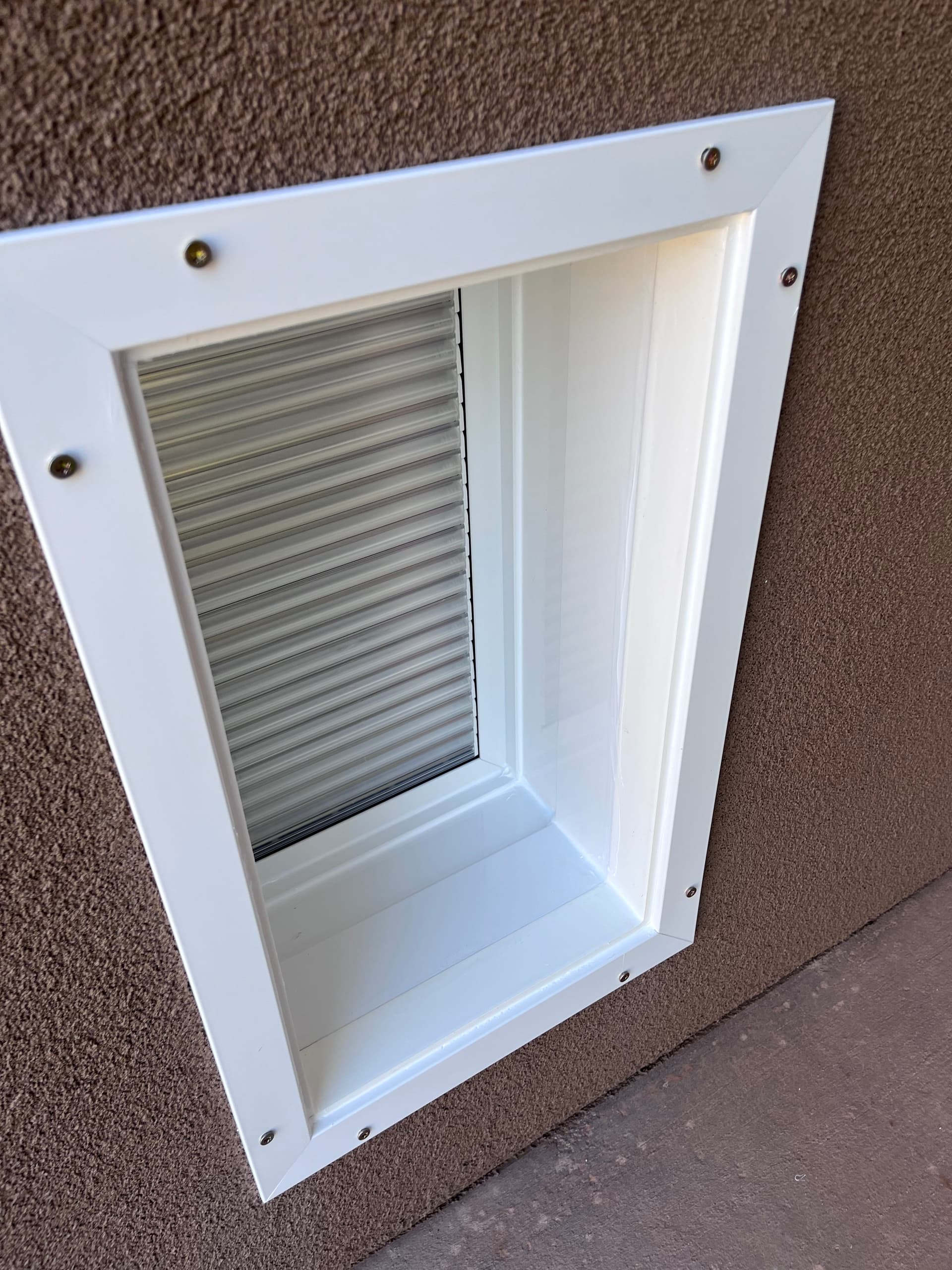 Gallery photos for Dog Door Through Stucco Wall - No Shortcuts Taken: Image #8