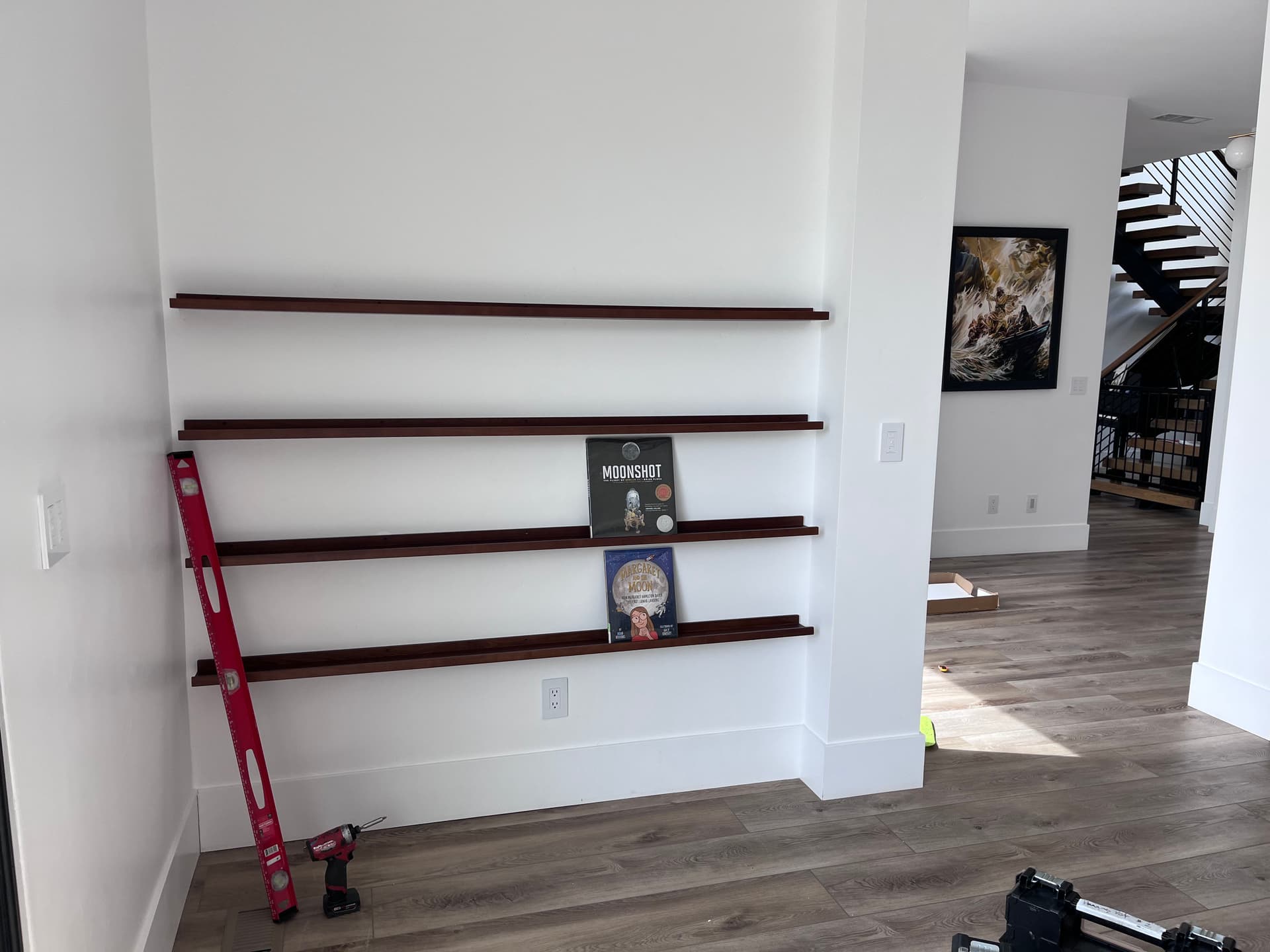 Floating Shelves Turned a Blank Wall Into a Kids Home Library image