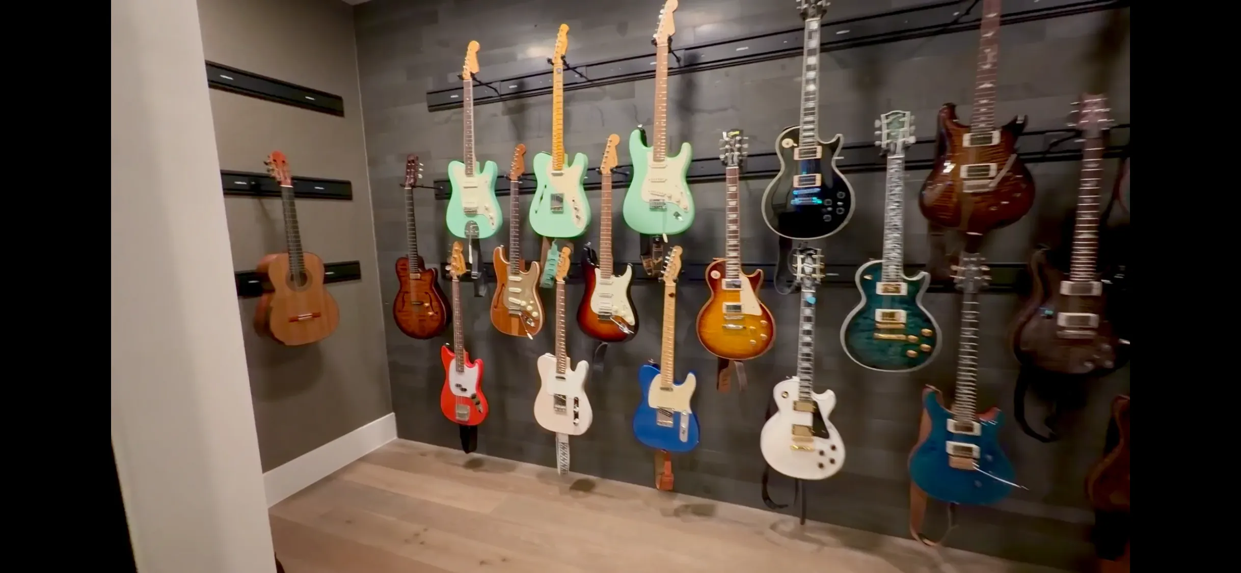 Gallery photos for Custom Guitar Wall Rack Installation for a Serious Collection: Image #1